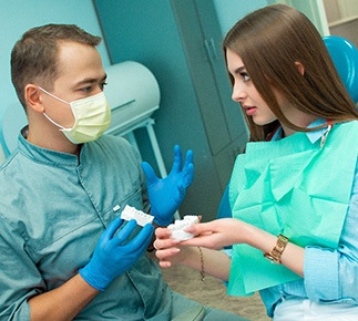 State College patient reviewing dental implant treatment plan