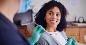Mom smiling awhile at the dentist